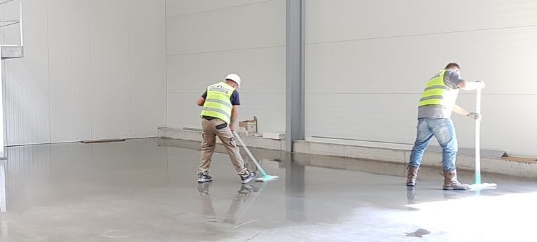 worker cleaning the warehouse