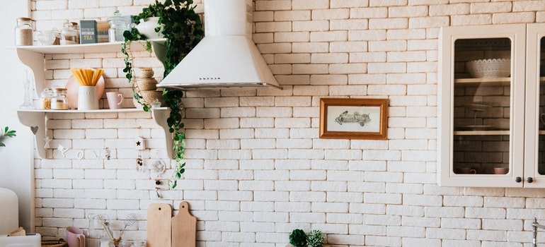floating shelves in kitchen as a great apartment remodeling idea