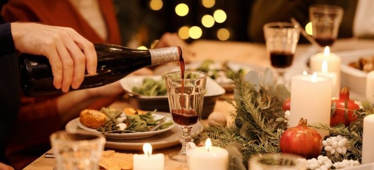 People enjoying Christmas dinner.
