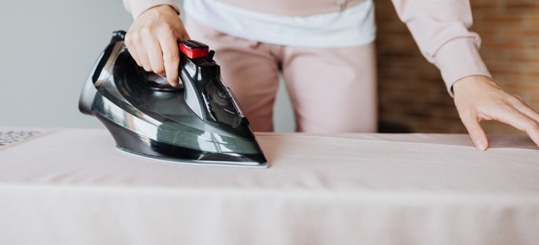 A person doing ironing