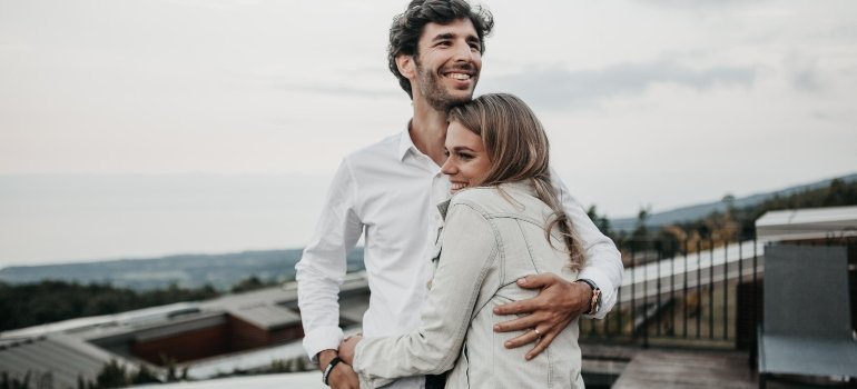 A happy couple hugging