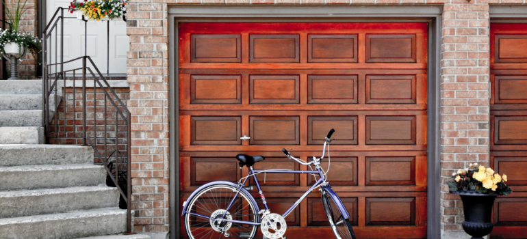 Bicycle in front of the garage