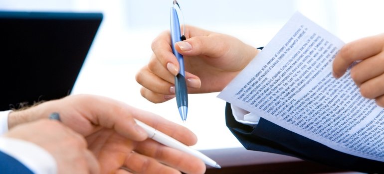 person holding a document