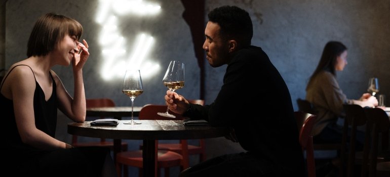 A woman and a man on a date in a restaurant