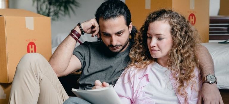 a couple making a plan to move to another NYC borough after a wedding