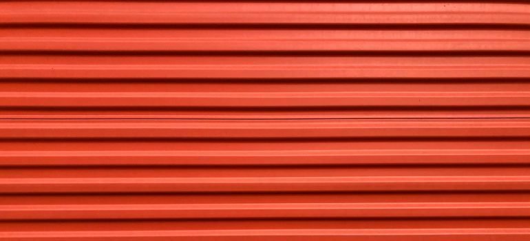 A closed door of an organized storage unit