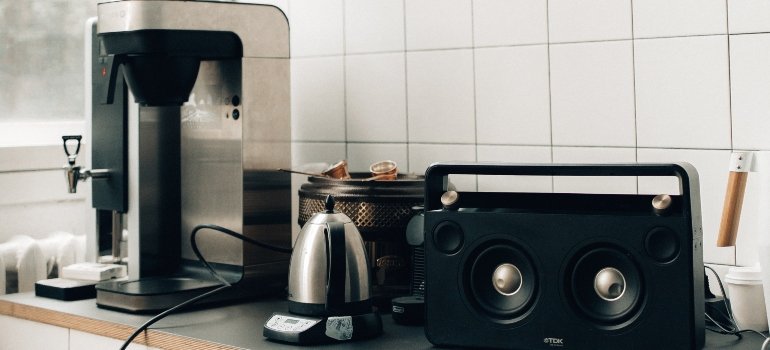 coffee makers and a stereo