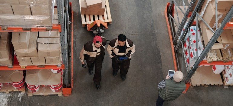 two guys inside a storage unit