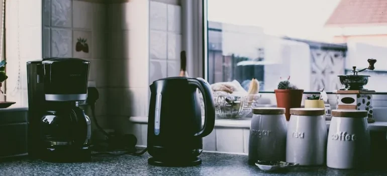 A kitchen counter with small appliances
