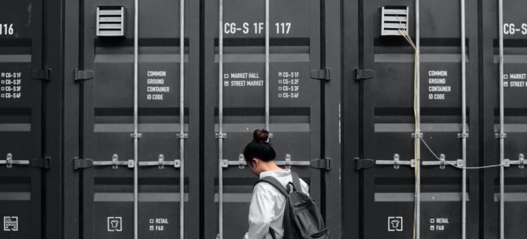 A girl in a storage unit.