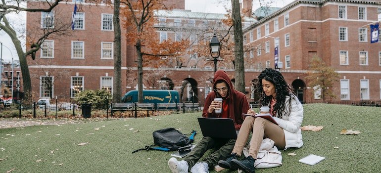 College students sitting on the grass