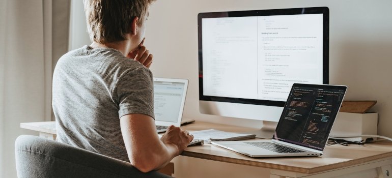 Man researching the cost of temporary housing in NYC