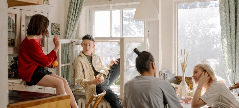 Studentsin a room talking