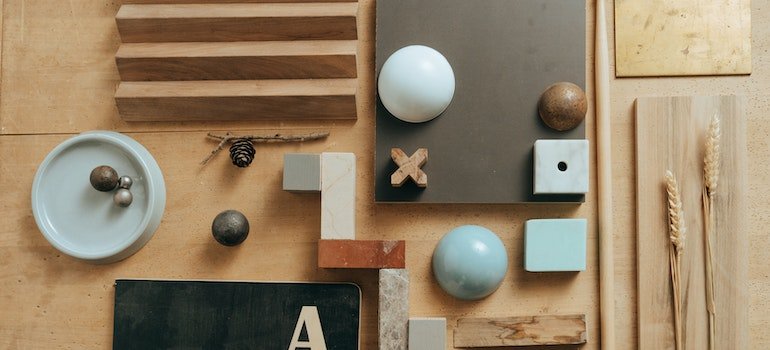 White and blue ball on brown wooden drawer