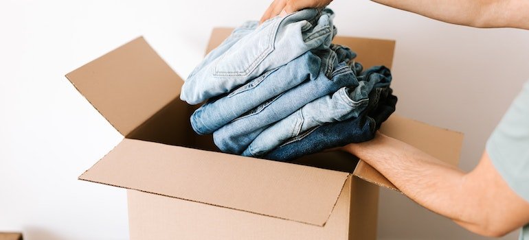 Packing a clothes in the box