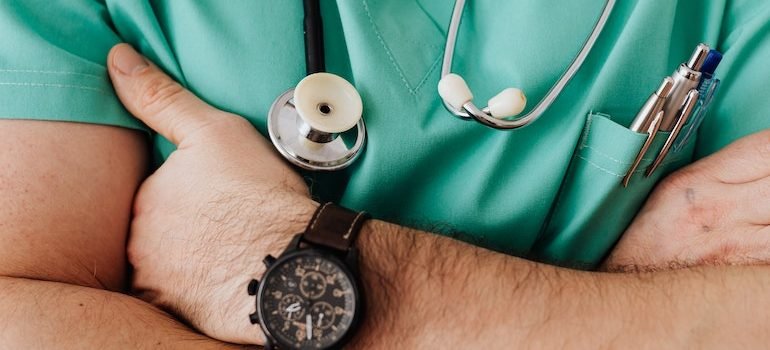 A doctor with hands crossed