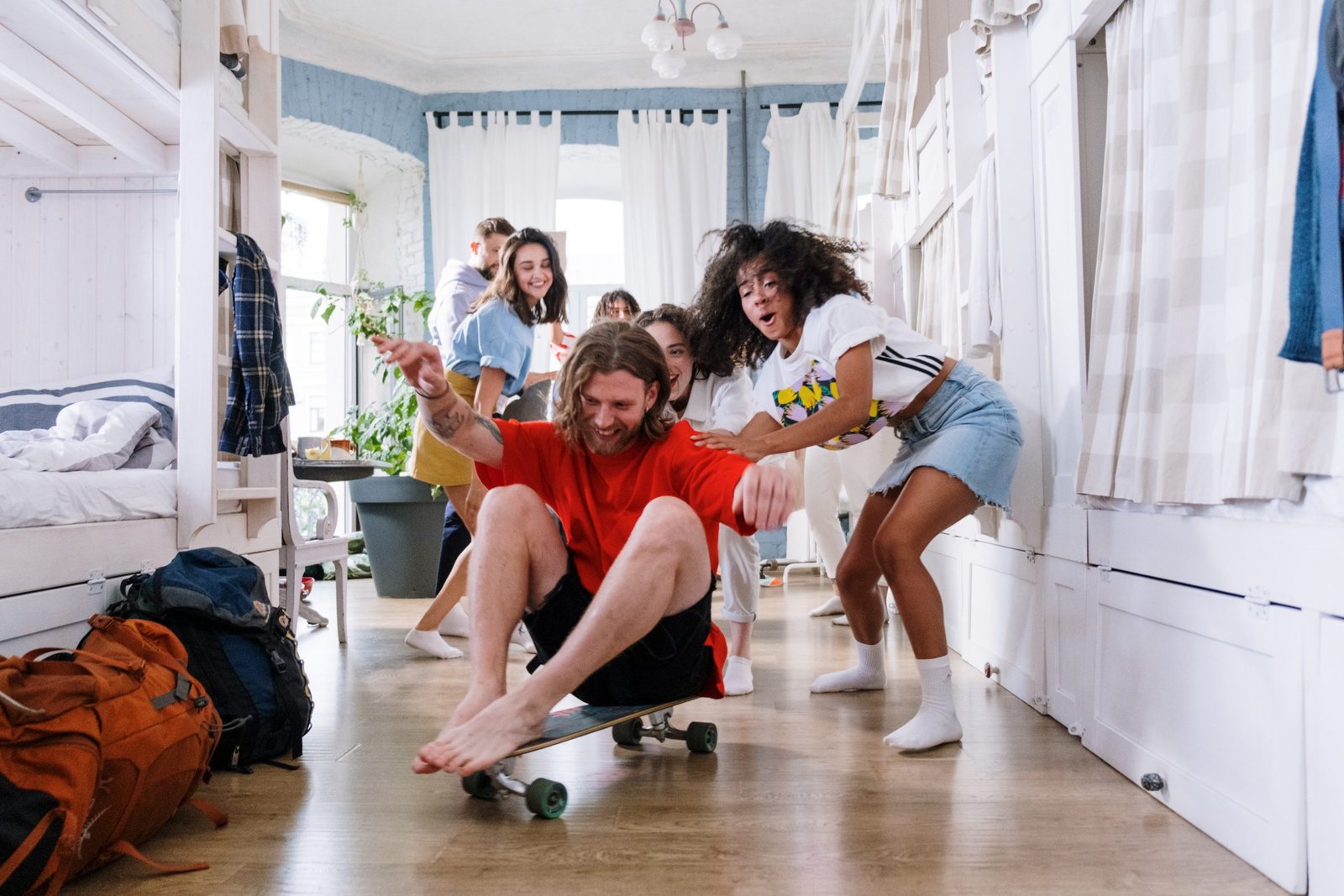 Group of students having fun in the dorm room