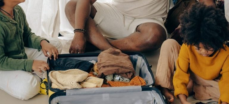 Family packing their clothes