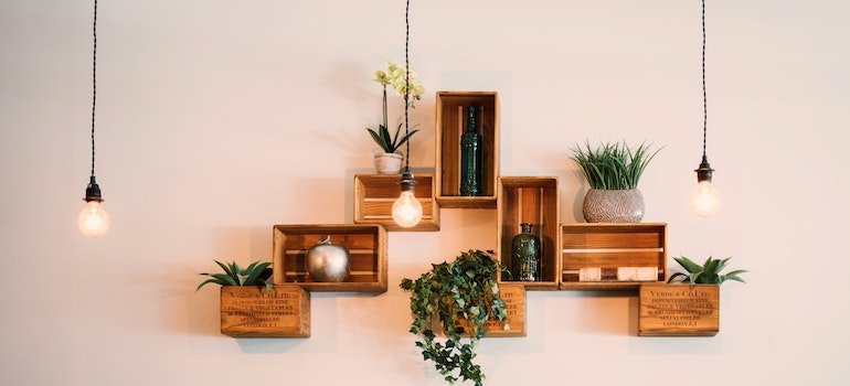 Some nice looking shelves with some plants on them.