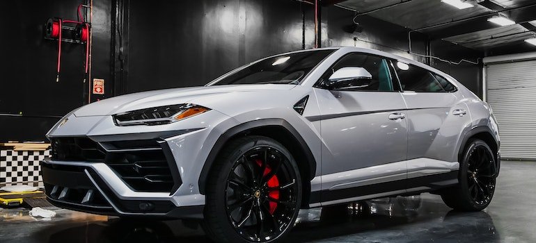 Modern car in lightning service garage.