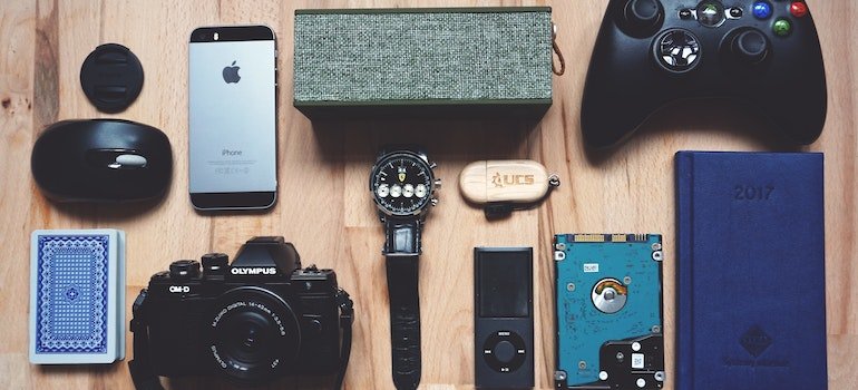 electronic gadgets on a wooden table