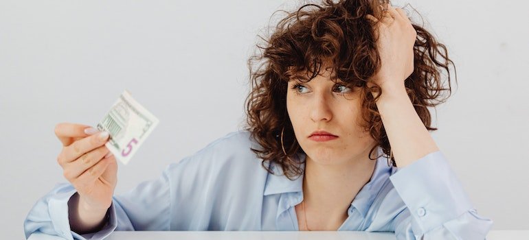 woman wondering why store your belongings during economic hardship