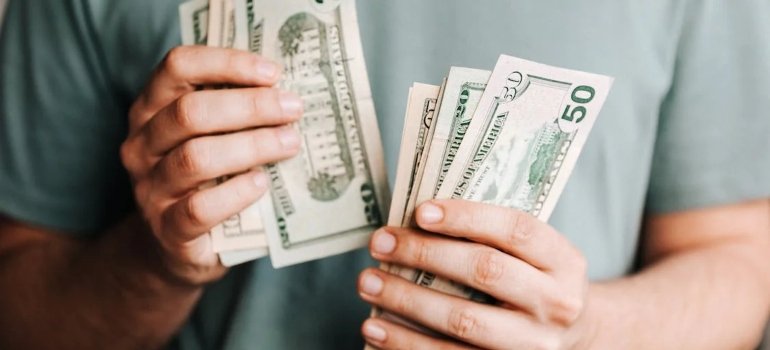 crop man counting dollars