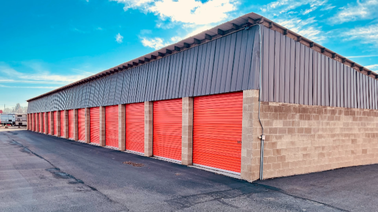 a storage unit with organge doors