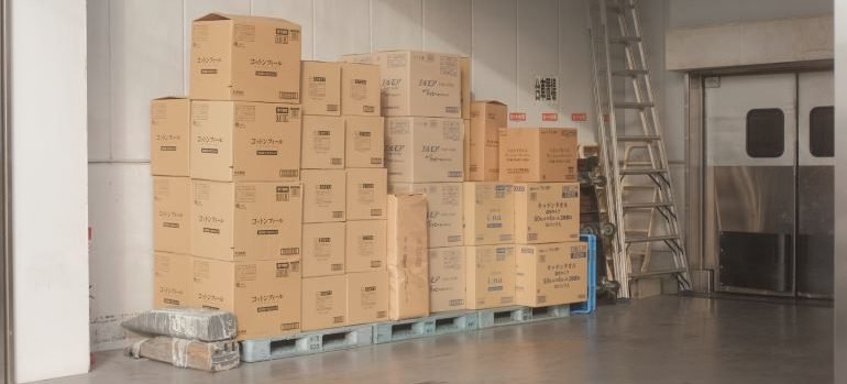 cardboard boxes inside a storage unit