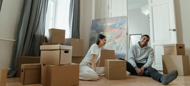 Man and woman with boxes