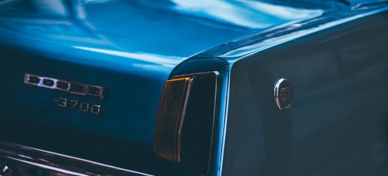 A picture of a blue dodger that is in need of different types of storage services for vehicles