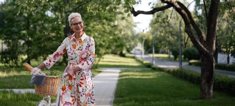 Senior woman with a bike