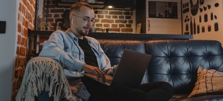 Picture of a man enjoying his home office in a Bronx apartment
