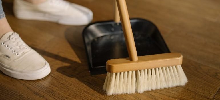 A person sweeping the floor