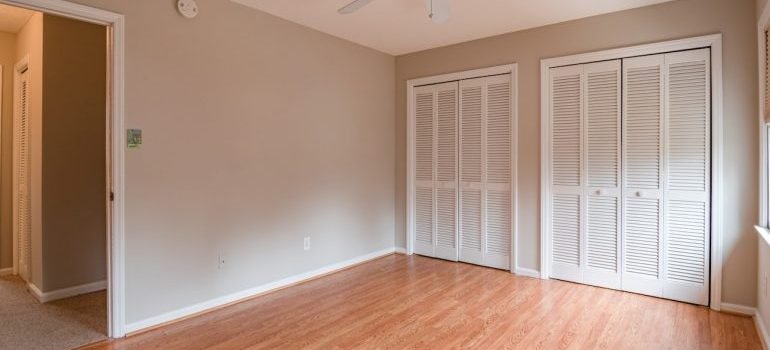 An empty room with a big closet