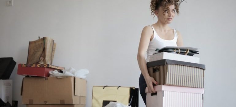 A person removing junk from apartment