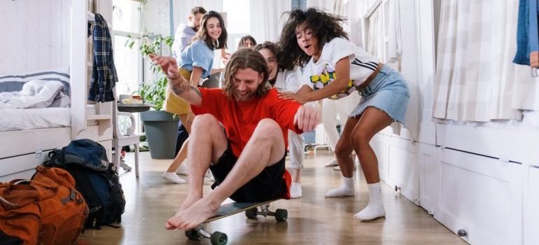 Students in a dorm room messing around