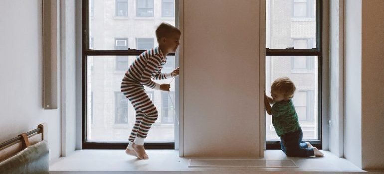 Kids playing hide and seek in the house
