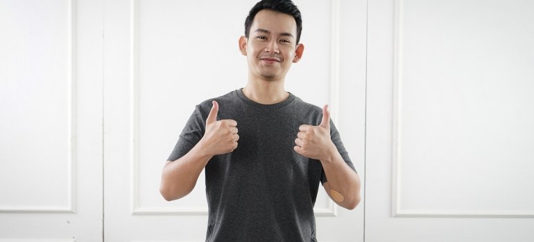 A person showing thumbs up for using temporary storage during apartment renovation.