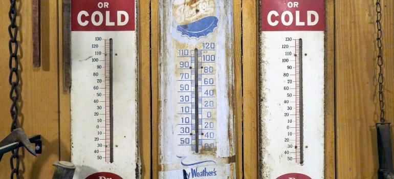 three thermometers set next to each other