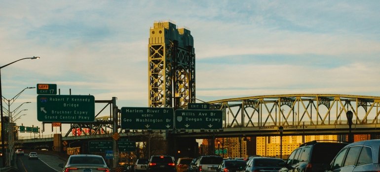 Cars on the road near the bridge