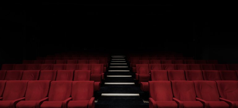 many red seats in a theater