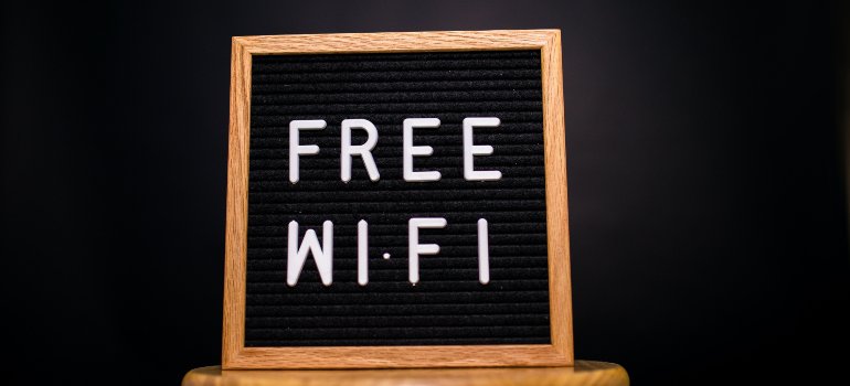 the sign that says "free wifi"