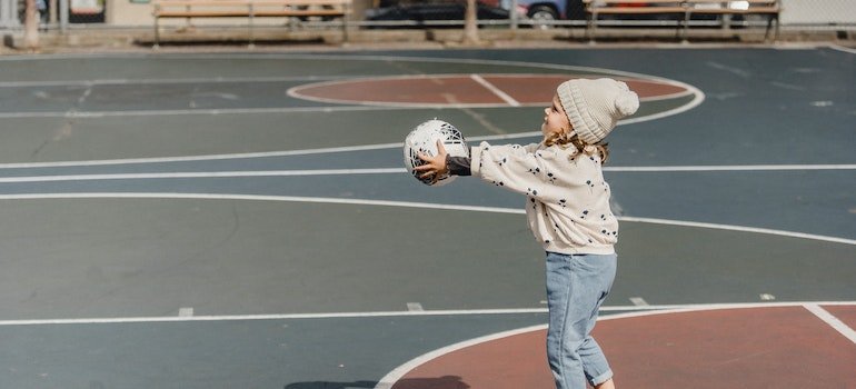 A child playing with a ball