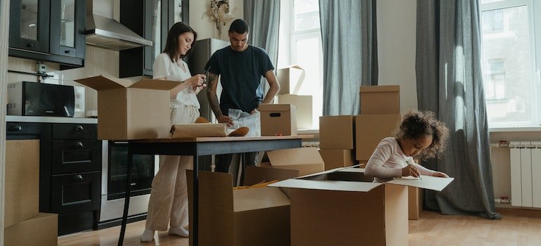 A family organizing their living space together