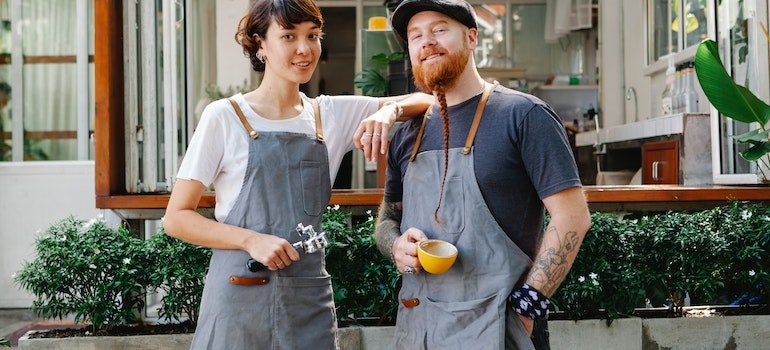 Coffee shop staff smiling