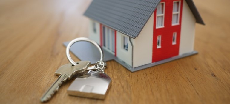 Keys and a home figure