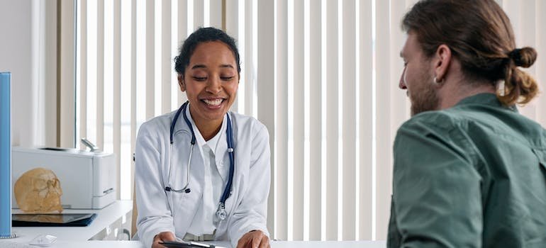 A doctor talking to her patient