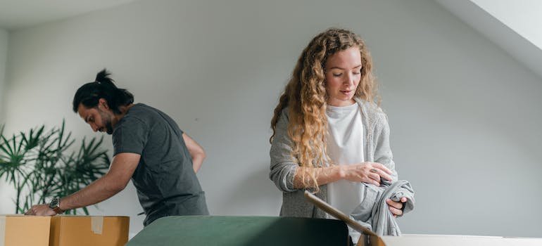 a couple preparing for packing
