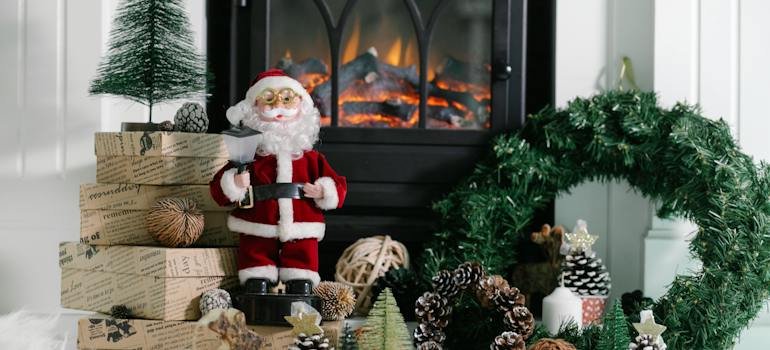 Christmas decorations in front of a fireplace, which will help you elevate your vacation rental